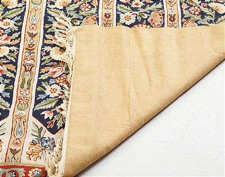 Broderad matta