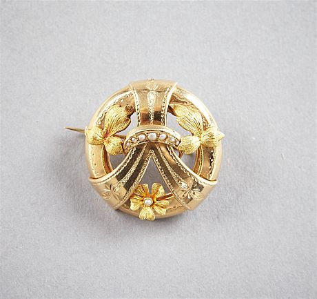 Brosch i 18 k guld