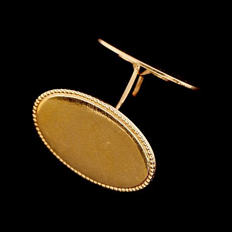 Manschettknappar guld 