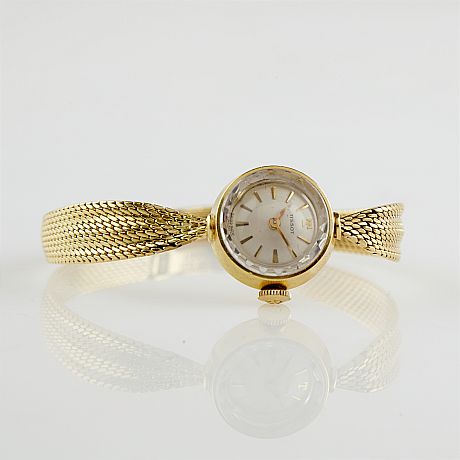 Tissot damarmbandsur 18 k guld