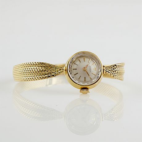 Tissot damarmbandsur 18 k guld