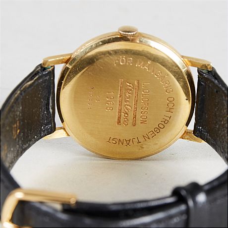 Longines herrarmbandsur i 18 k guld