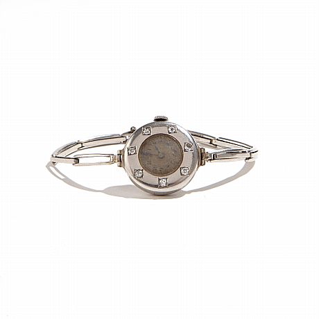 Armbandsur i platina samt vitguld