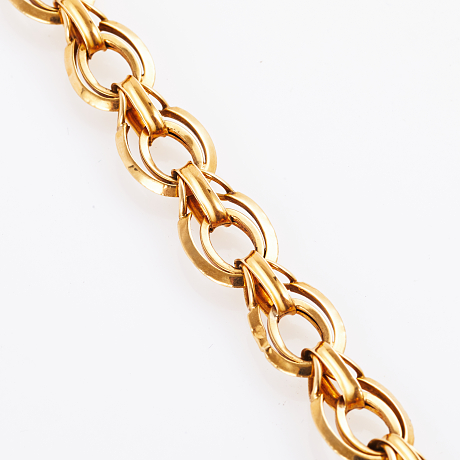 Klockkedja i 18 k guld