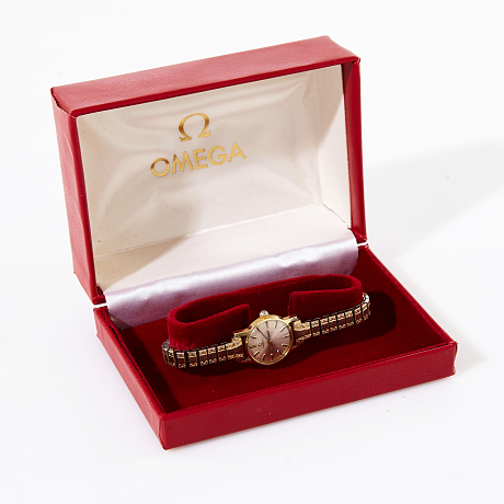 Omega damarmbandsur i 14 k guld