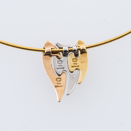 Hängmycke i guld av Georg Jensen