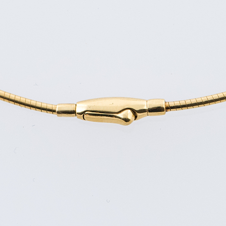 Hängmycke i guld av Georg Jensen