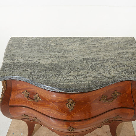 Byrå 1900-tal rokokostil