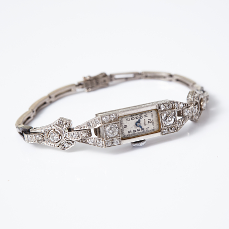 Damarmbandsur 18 k vitguld diamanter